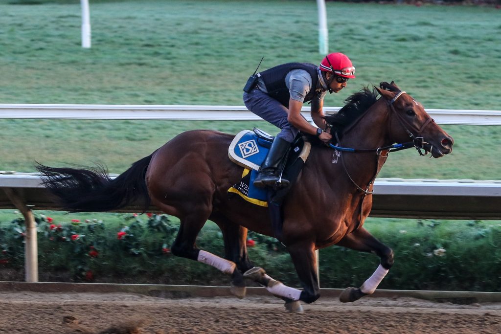 Flightline works for the Pacific Classic, Ernie Belmonte Photo, Past The Wire