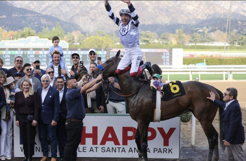 Frankie Dettori flying dismount from Country Grammer after winning The San Antonio