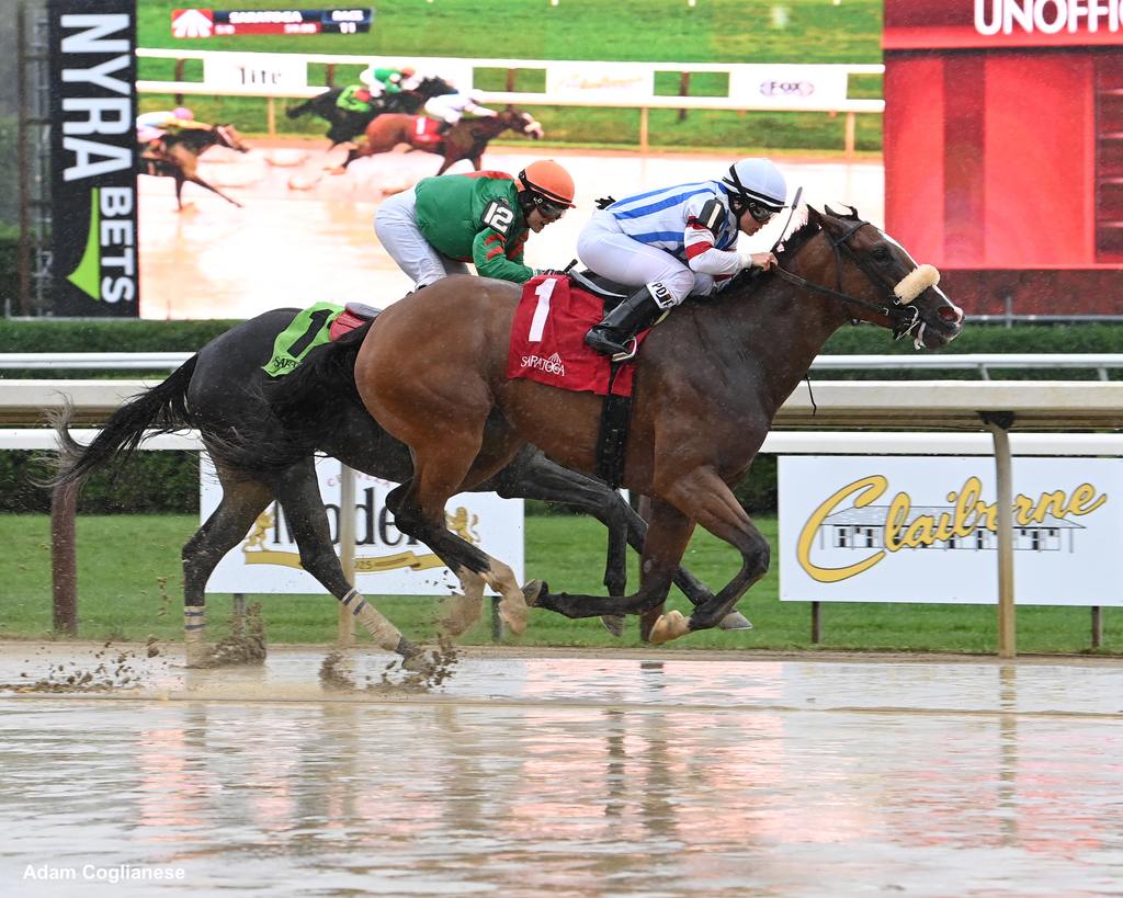 On a sloppy track at Saratoga on July 29, Katie piloting Queens Dancer (#1 outside) narrowly beat sister Jackie aboard Sandy’s Garden in a $95,000 5-1/2 furlongs Allowance. (Adam Coglianese)