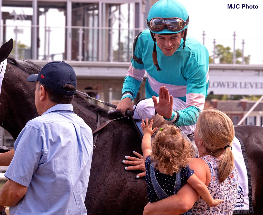 Brittany and daughter Edy congratulate Sheldon on a winning ride. (MJC Photo)