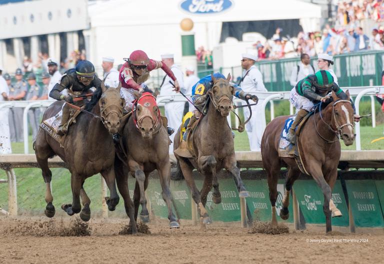 It’s Mystik Dan by a nose over Sierra Leone in the $5 Million Kentucky Derby before crowd of 156,710. (Jenny Doyle/Past The Wire)