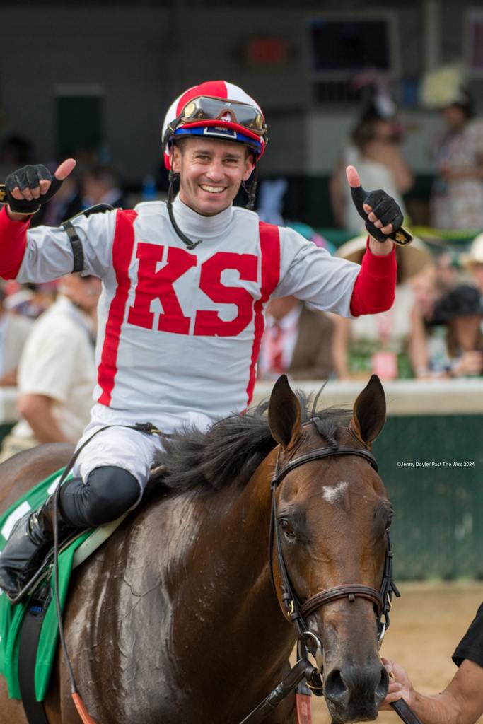 An elated Flavien Prat aboard Program Trading. (Jenny Doyle/Past The Wire)