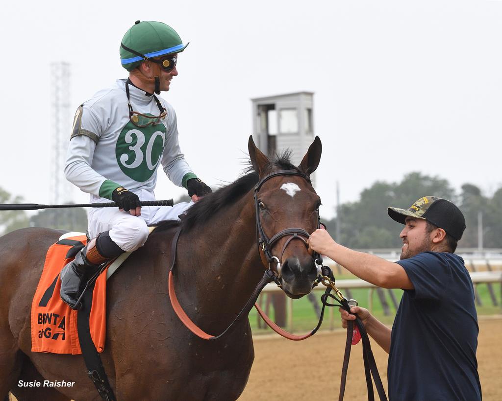 Pratt aboard Moonage Daydream after their victory. (Susie Raisher)