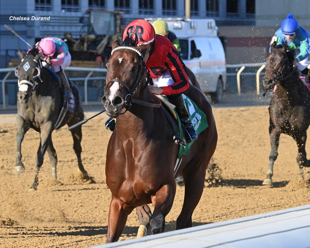 Nic's Style moves up the rail under Alvarado. (Chelsea Durand)