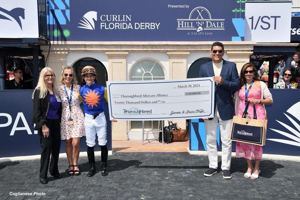 James and Shari Ough presenting their 2024 TAA donation check. (Coglianese Photo)