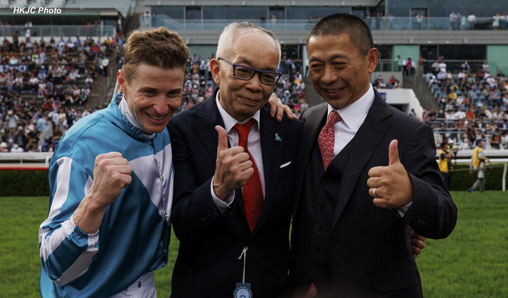 Peter Lau (middle) with jockey James McDonald and trainer Danny Shum. (HKJC Photo)