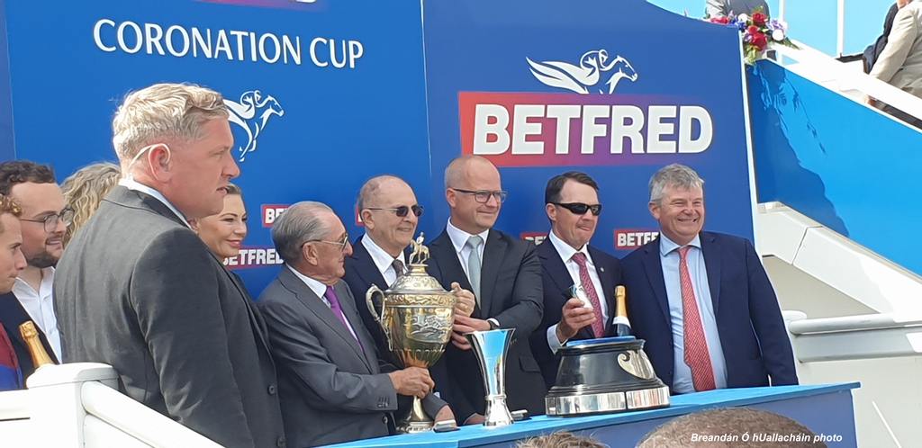 Coolmore partners on the winner's rostrum at Epsom Racecourse. (Breandán Ó hUallacháin photo)