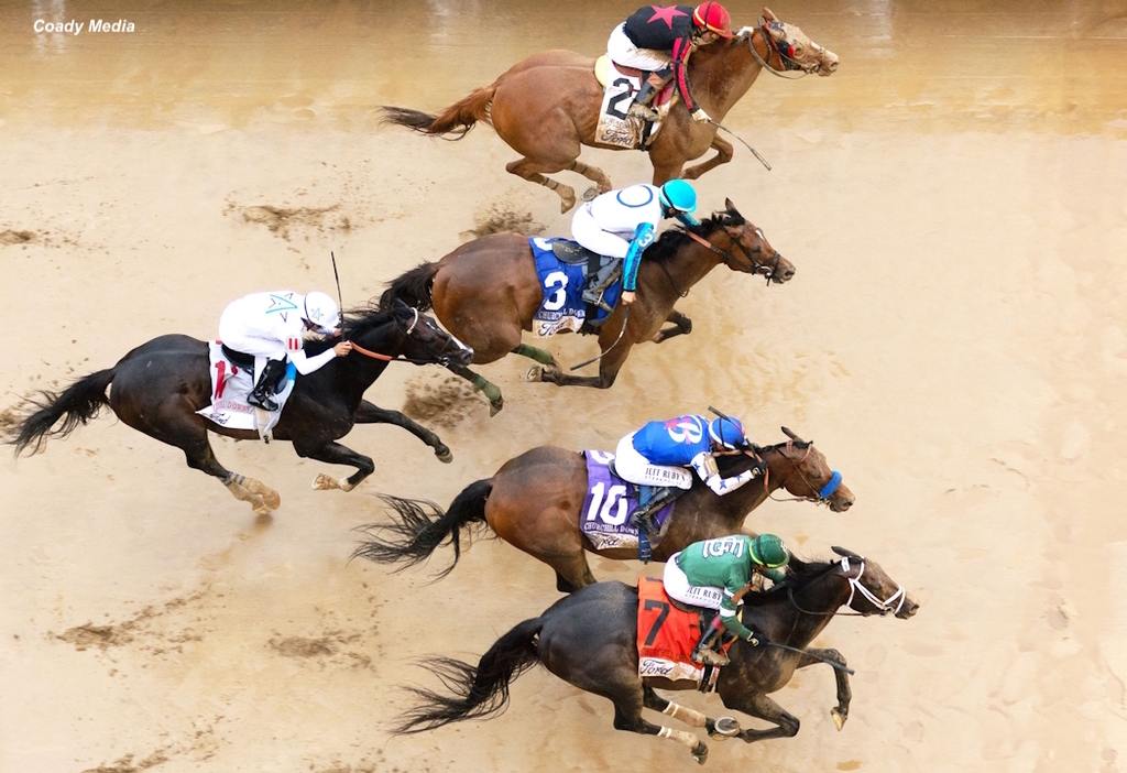 Mindframe (7) won the shake in a four-way photo finish for the Churchill Downs Stakes over Nysos (10), Book’em Danno (3) and Banishing (2). (Coady Media)