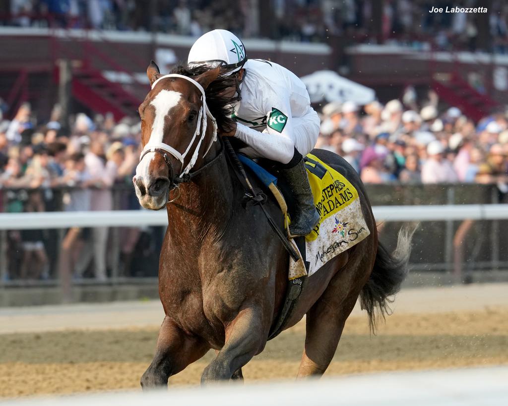 Patch Adams and Luis Saez hustle to the victory. (Joe Labozzetta)