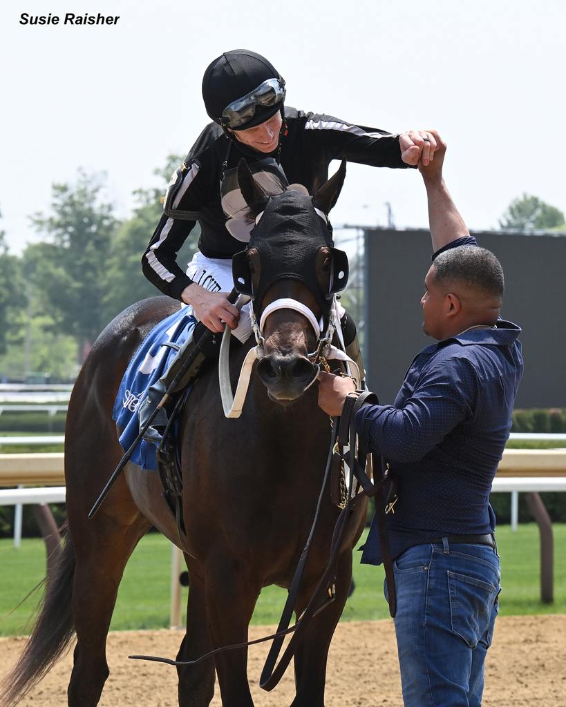 Jareth Loveberry congratulates Sassy C W's groom on their victory. (Susie Raisher)