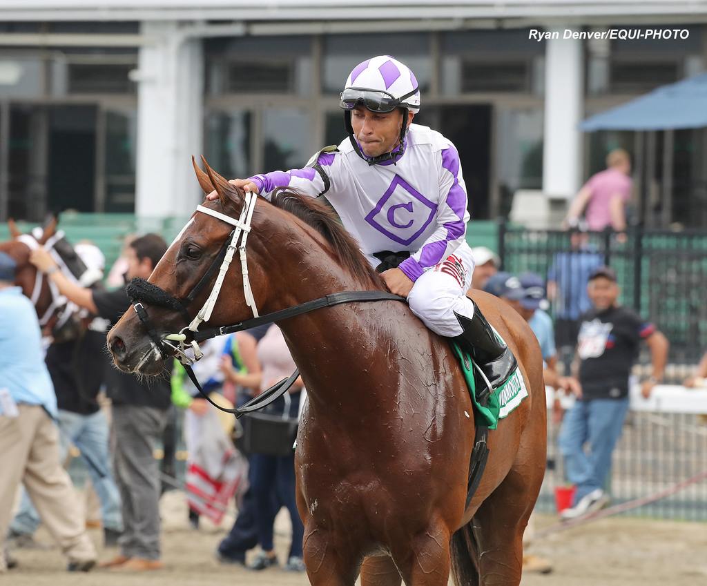 Sonny Leone gives Gerrards Cross an appreciative pat post-race. (Ryan Denver/EQUI-PHOTO)