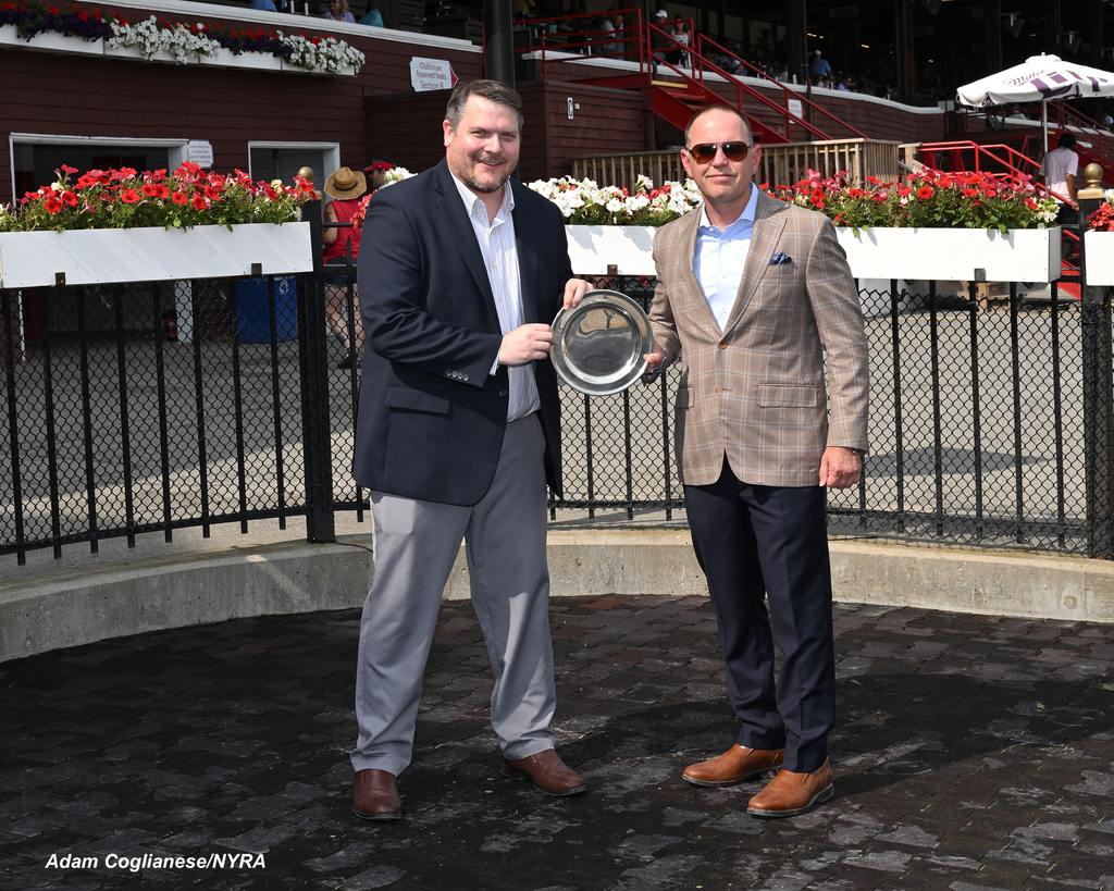 Chad Brown receives title trophy. (Adam Coglianese/NYRA)