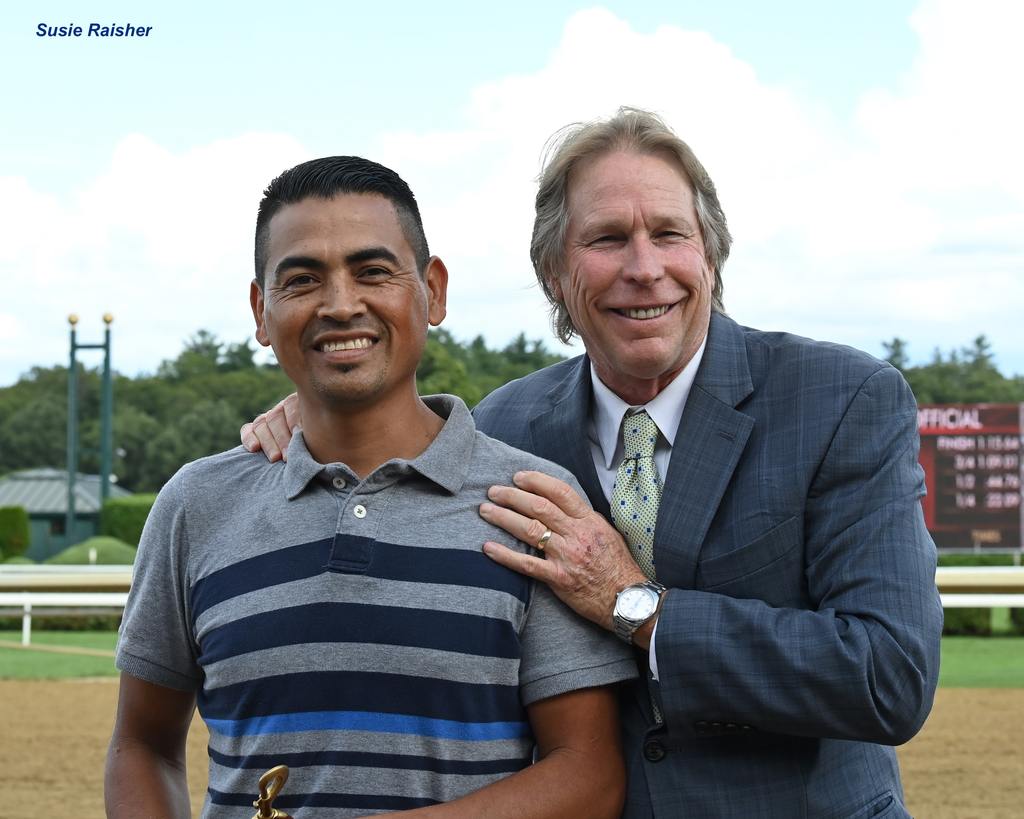 Trainer Dallas Stewart (right) with Smoken Wicked’s groom. (Susie Raisher)