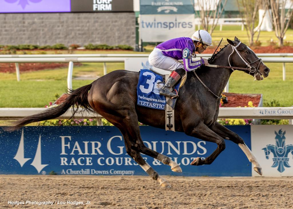 Tiztastic with Joel Rosario aboard wins the 112th running of the $1,000,000  Grade II Louisiana Derby at Fair Grounds.  (Hodges Photography / Lou Hodges, Jr.)