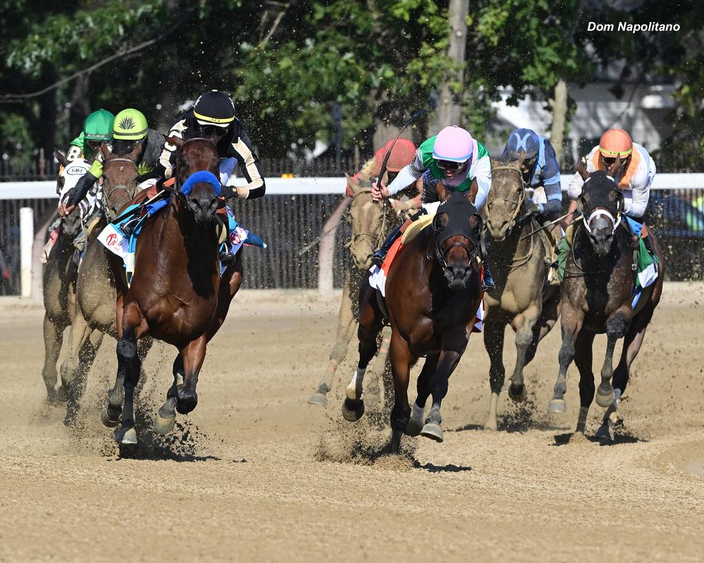 Hope Road and Jose Ortiz swing wide to take the lead. (Dom Napolitano)