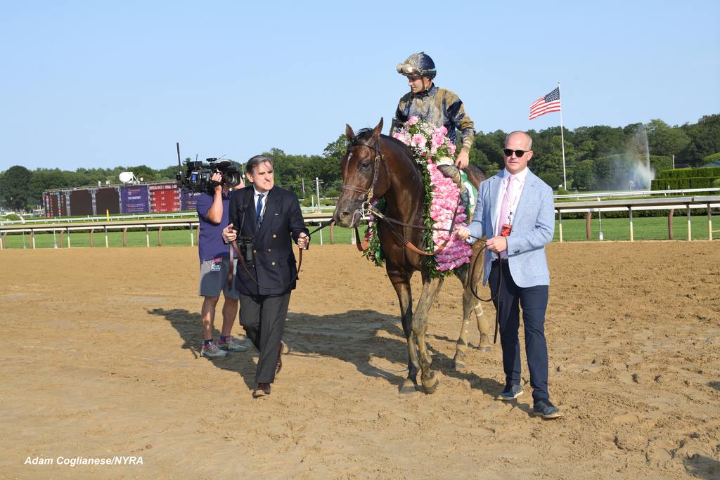 Part owner Peter Brant walks Sierra Leone to the winner’s circle. (Adam Coglianese/NYRA)
