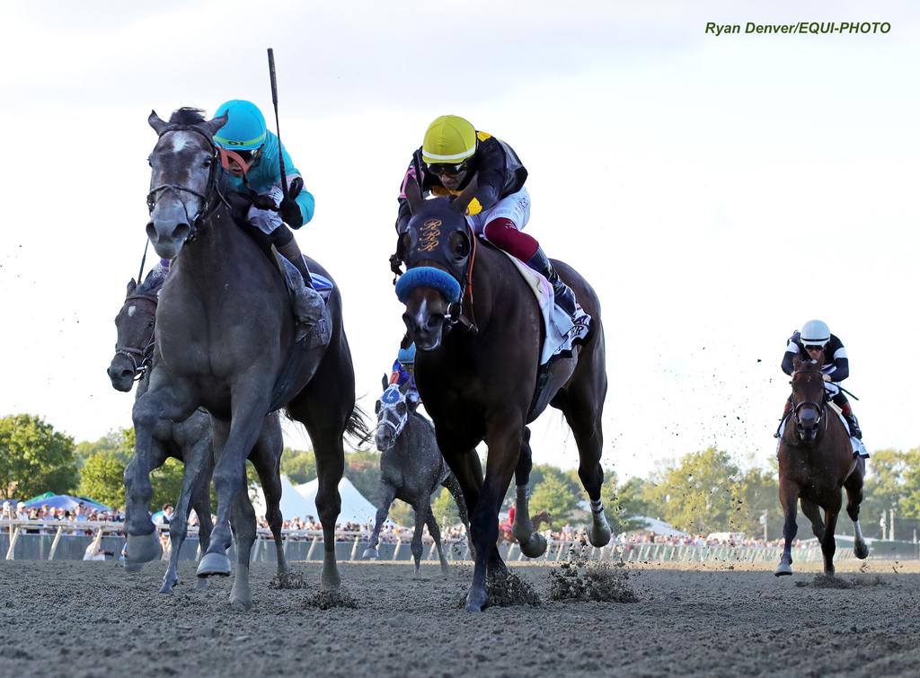 Clicquot and Ortiz, Jr. battle for the lead.(Ryan Denver /EQUI-PHOTO)