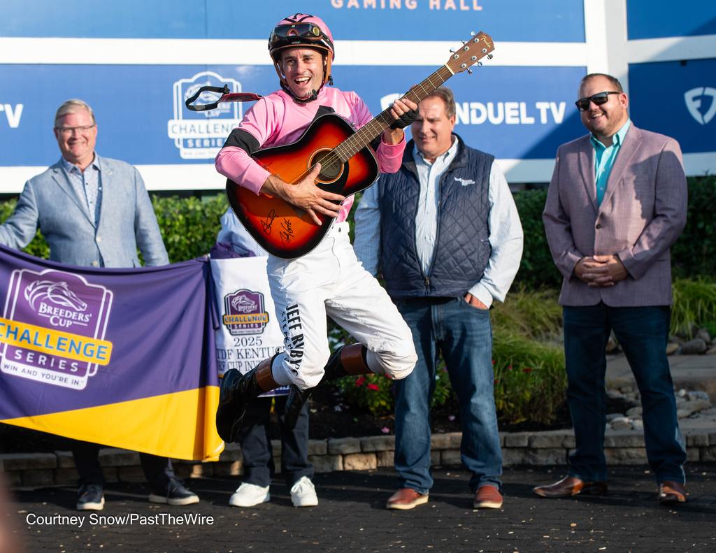 Flavien Prat hooting it up in the winner’s circle. (Courtney Snow/Past The Wire)
