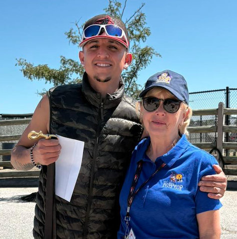 Friday’s judge Sallyellen Hurst with winning groom Oscar Maldanelo. Thank you to Valvo Racing and Training Friday’s sponsor and all of the daily sponsors. (Sally Eck/Facebook)