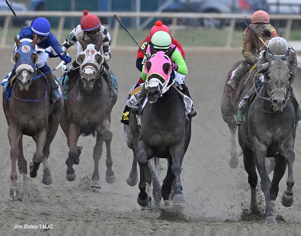 Barbadian Runner (center) with Post Time on the inside. (Jim Duley/TMJC)