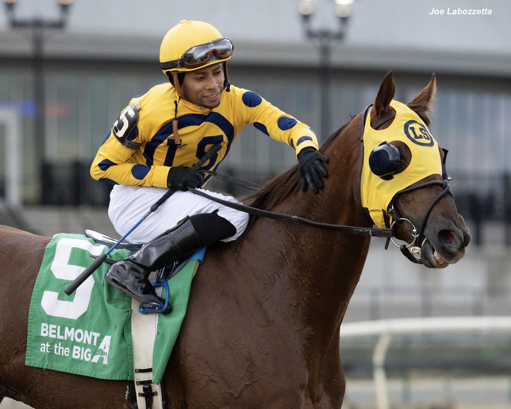 Manny Franco and Bank Frenzy celebrate victory. (Joe Labozzetta)